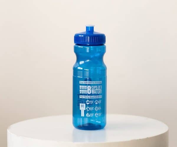 One side of the blue TrueSport branded water bottle.